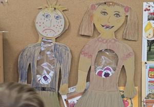 Sylwety dzieci z przezroczystymi żołądkami.